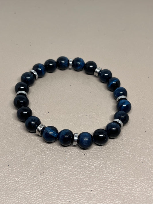 Blå tigerøyne og sølv