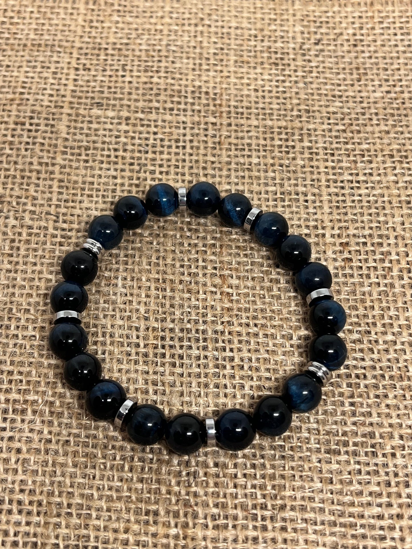 Blå tigerøyne og sølv