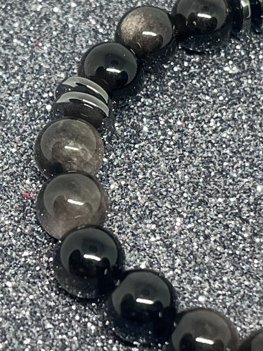 Sort sølvobsidian med sort hematitt