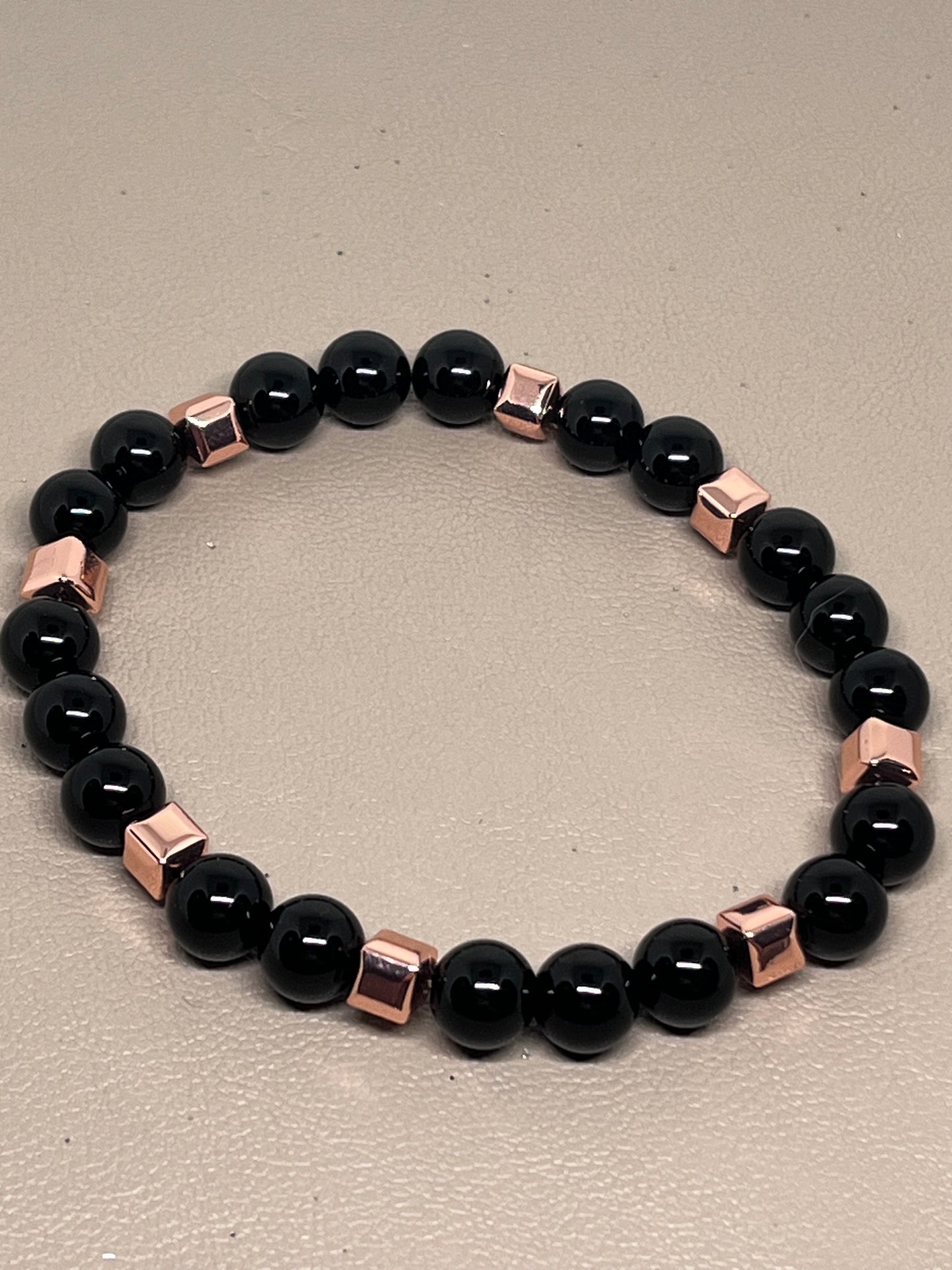 Sort onyx og roségull