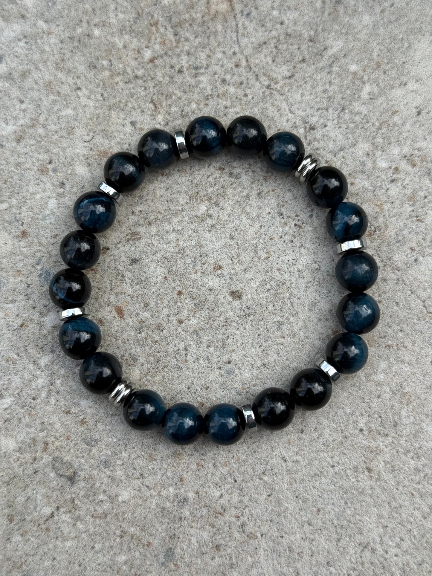 Blå tigerøyne og sølv