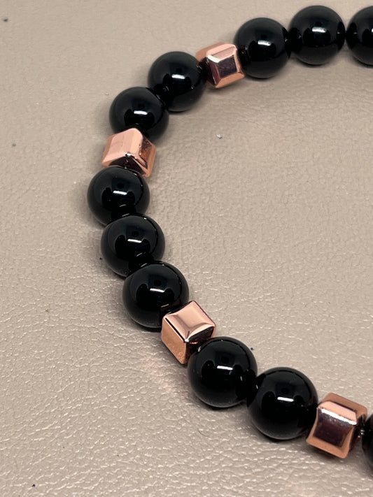 Sort onyx og roségull